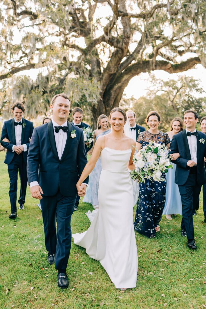 Couple celebrates getting married at Airlie Gardens with family and friends