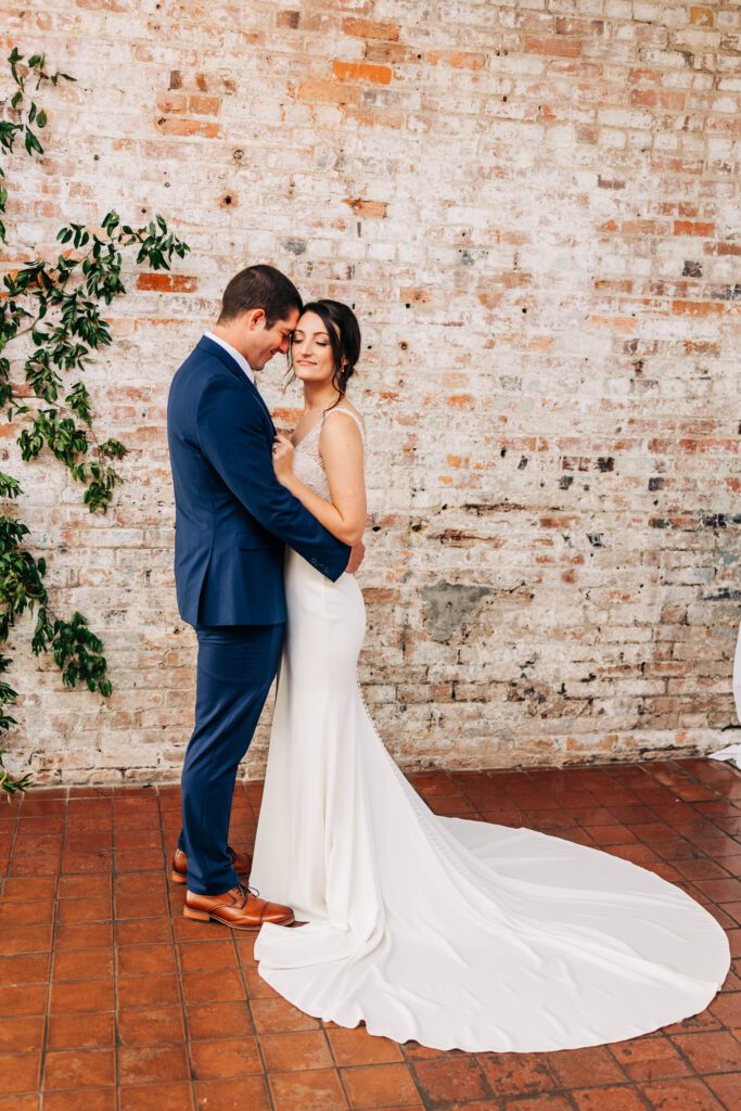 Couple embraces after first look at Bakery 105