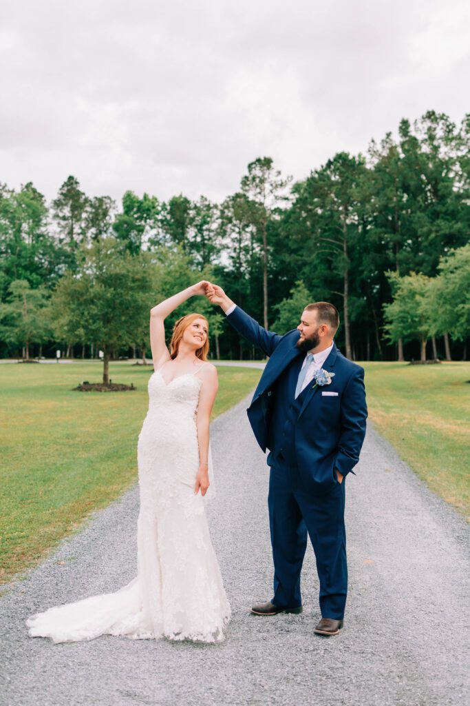 Bride and groom dance after getting married at Barn at Rock Creek