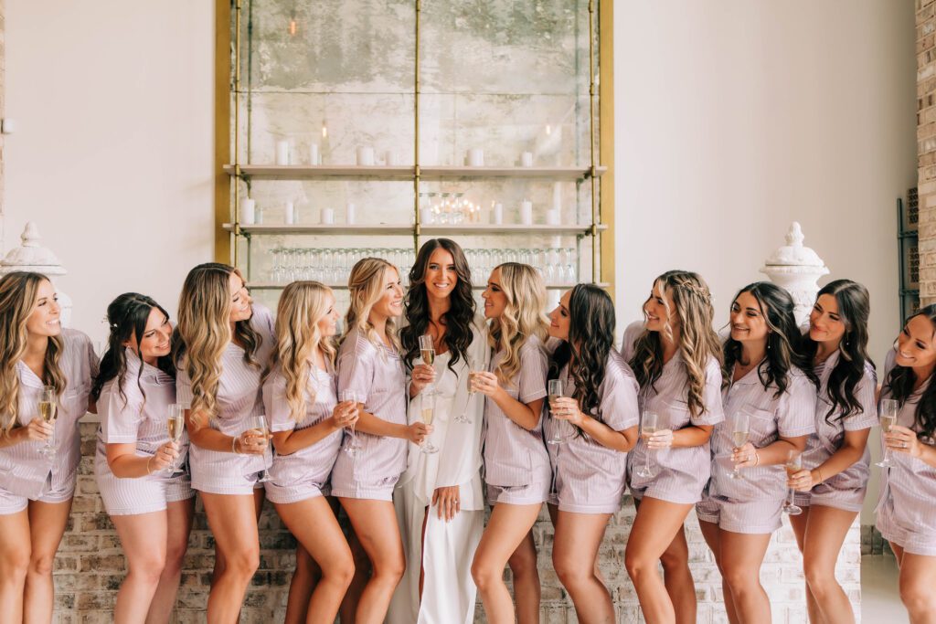 Bridesmaids toasting the bride at Wrightsville Manor